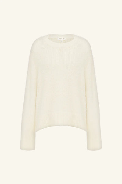 Front studio view of the Shona Joy Korine Boucle Knit in snow white showing round neckline, dropped sleeves, ribbed cuffs, and plush wool-blend textured knit.