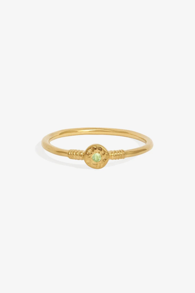Studio product shot of the Temple of the Sun Bia Ring in 18k Gold Vermeil featuring a single round green tsavorite stone set on a thin band against a plain white background.