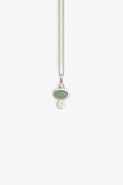 Studio product shot of the Temple of the Sun Ma Necklace in Sterling Silver featuring a green aventurine cabochon and white zircon pendant.