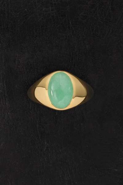 Top-down product photo of the Temple of the Sun Ma Ring in 18k Gold Vermeil displaying the green aventurine stone on a dark background.