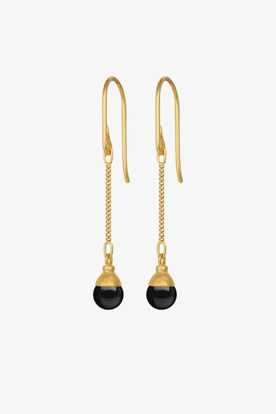 Studio product shot of the Temple of the Sun Sela Earrings in 18k Gold Vermeil featuring 6mm black onyx beads suspended from gold hooks.