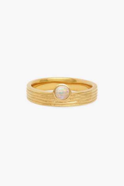 Studio front shot of the Temple of the Sun Soma Ring in 18k Gold Vermeil featuring a round Australian opal cabochon on a textured gold band.
