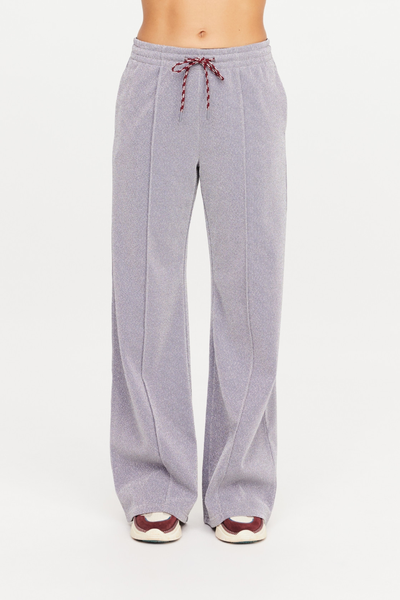 A straight-on, full-length studio shot of the Galaxia Marnie Wide Leg Pants in Starry. The image showcases the high-waisted elastic band with its contrast maroon drawstring, the clean-lined front pin stitches, and the roomy wide-leg silhouette.
