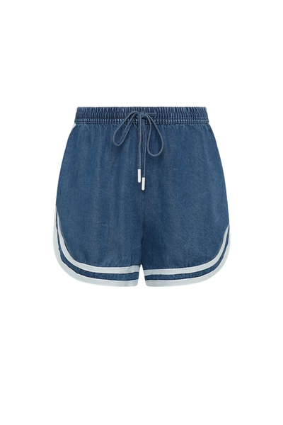 Studio flat lay view of mid-rise relaxed denim chambray shorts featuring a soft elasticated waistband, matching drawcord with cream aglet ends, and contrast cream binding along the curved hemline.