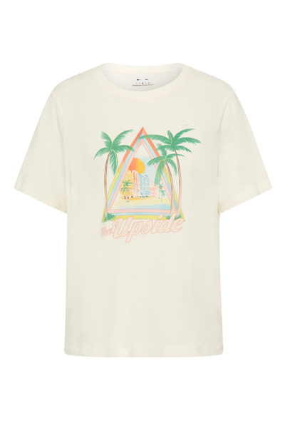 Studio flat lay view of a classic cream organic cotton crewneck t-shirt featuring a colorful retro tropical palm tree and resort chest graphic with script text reading "The Upside".
