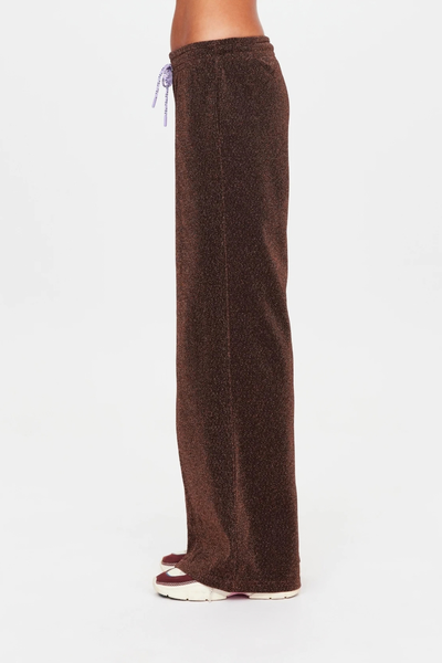 Side profile view of the espresso metallic sparkle wide-leg pants against a plain white background.