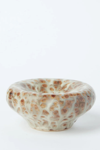 Studio side view of the Gentle Habits Vessel Incense Holder in Seafoam showcasing its rounded ceramic basin and textured seafoam blue and brown reactive glaze.