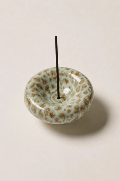 High-angle studio view of the Gentle Habits Vessel Incense Holder in Seafoam holding an upright incense stick on a clean white backdrop.