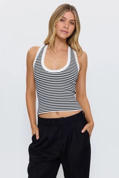 Medium front view of a model styled in the Thrills Astra V Neck Tank in Black Stripe paired with black relaxed-fit trousers.