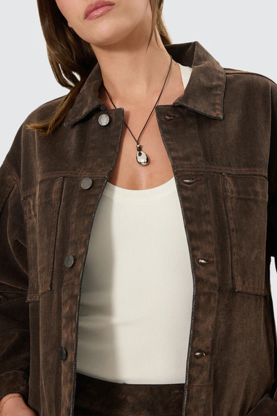 A closer front e-commerce image displaying the heavy-weight 12.3 oz denim jacket buttoned up, showcasing the clean alignment of the front panel seams and symmetrical buttoned chest pockets.