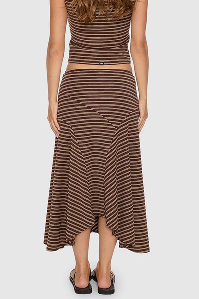 Back view of model wearing the brown striped Thrills Best of Luck Sienna Midi Skirt in Cocoa, displaying the low-waisted fit and flared midi hem.