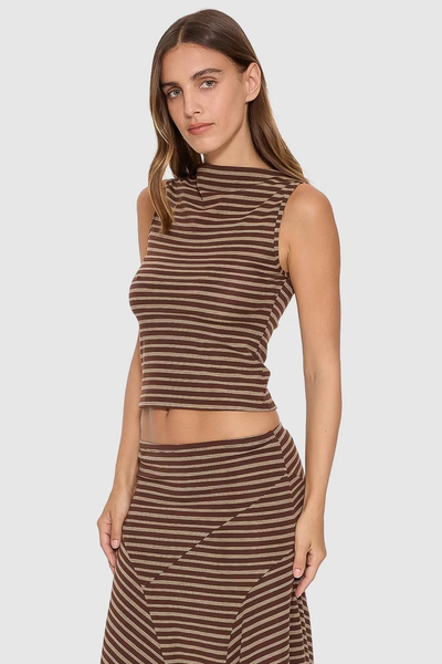 Three-quarter front view of model wearing the brown striped Thrills Best of Luck Tank in Cocoa paired with the matching low-rise midi skirt.