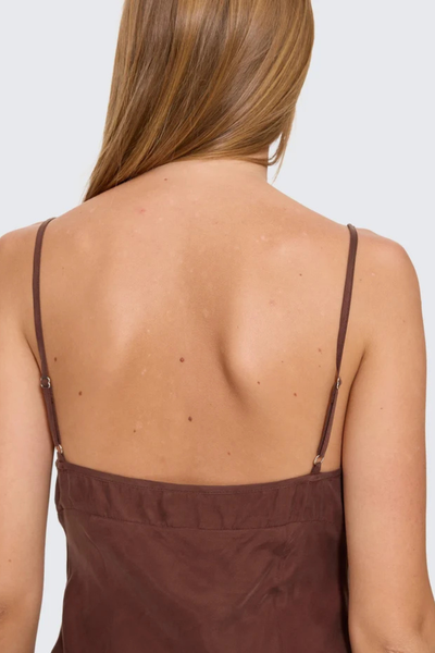 Close-up back detail shot showing the upper back and adjustable spaghetti straps of the Thrills Elio Bias Mini Dress in Cocoa.