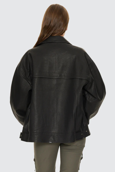 A full-length product shot from the back on a model wearing the black bomber jacket, demonstrating the broad shoulder silhouette, horizontal back yoke panels, and the gathered elastic detailing along the hem.