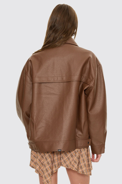 A rear-angle studio shot focusing on the upper shoulders and the neat structure of the down-turned collar.