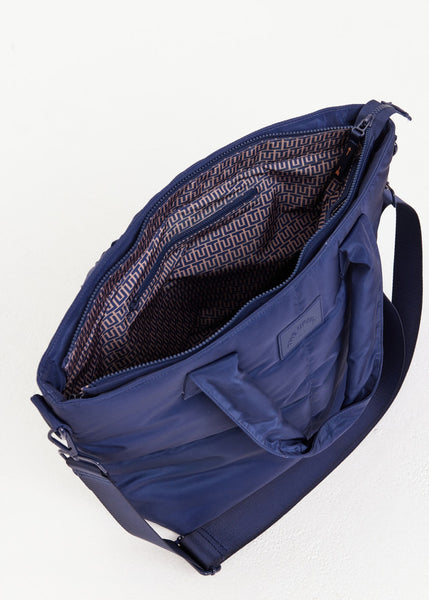 Blue bag with open front pockets