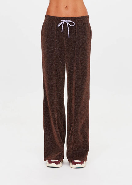Front-facing studio view of the espresso metallic sparkle wide-leg pant, highlighting the pin-tuck details and purple paracord drawcord.