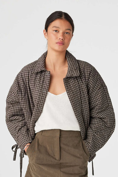 Features a 100% cotton outer and lining with a warm polyester filling.
