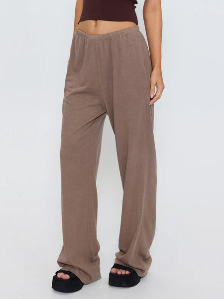 Three-quarter studio view highlighting the casual construction and comfortable, baggy drape of the Thrills Hemp Relax Pant in Falcon brown.