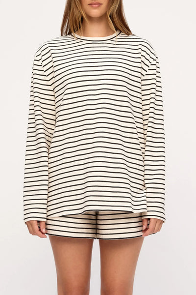 Cropped studio photo highlighting the classic crew neckline and horizontal black stripes of the Zulu & Zephyr Jersey Long Sleeve Top in Black Stripe.