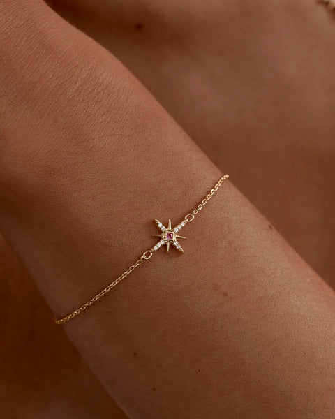 18k gold vermeil star bracelet with lab-grown pink sapphire and cubic zirconia.