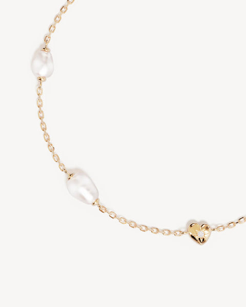 Features an adjustable slider and diamond cut chain.