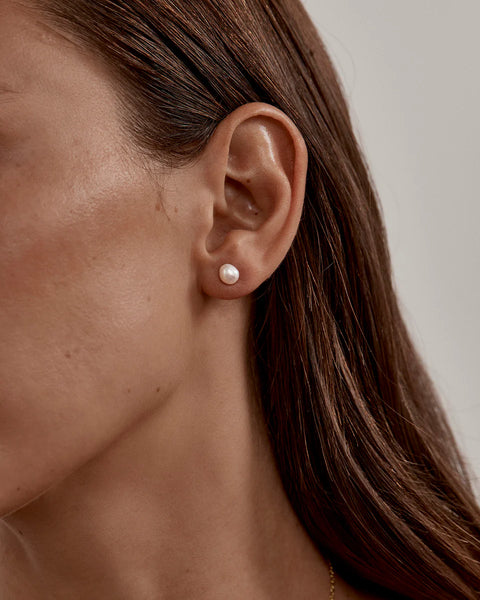 18k gold vermeil stud earrings featuring 6mm baroque freshwater pearls. A beautiful keepsake representing love and connection.