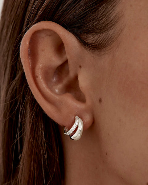 Sterling silver double band illusion hoops with cubic zirconia. A polished everyday staple for love and connection.