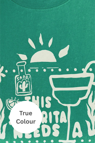 Close-up view of the hand-drawn "This Señorita Needs A Margarita" graphic on the front of Sabbi The Very Oversized Margie Tee in Forest Green.