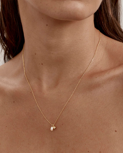 Gold necklace with a heart-shaped pendant 