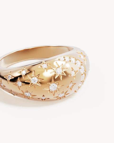 Gold ring with star-shaped diamond designs