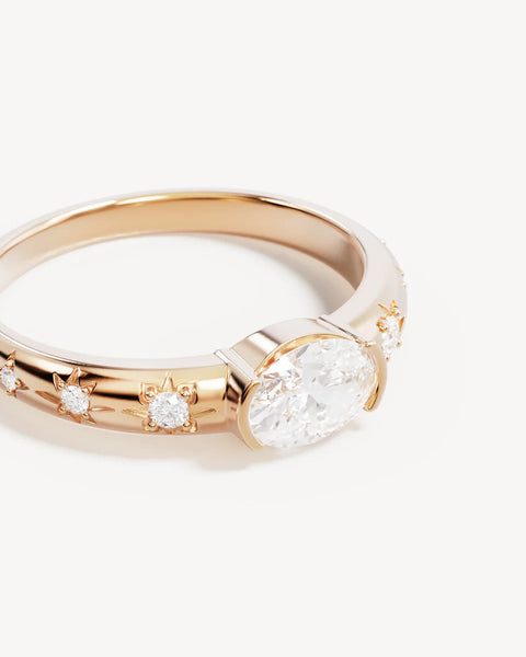 Gold ring with a sparking cubic zirconias
