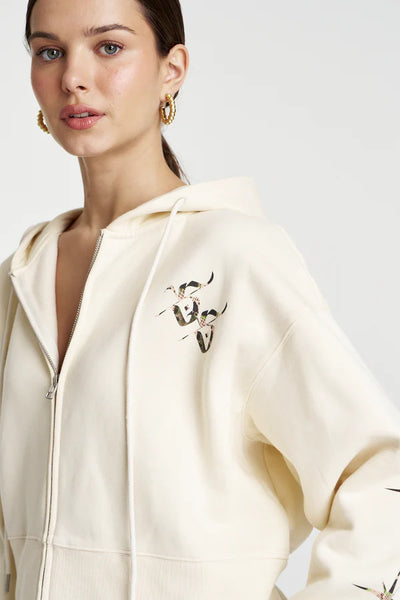 Detailed shot of the neckline and hood construction, showcasing the clean stitching and the structured yet comfortable drape of the heavy-weight fleece.