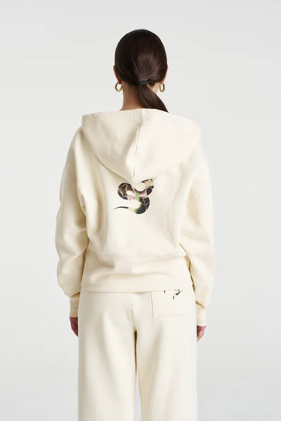 Back profile focusing on the slouchy dropped shoulders and the effortless, oversized silhouette of the heavy-weight cotton blend.