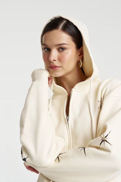 A close-up of the 300gsm brushed fleece in Vanilla, highlighting the thick, premium texture and the soft matte finish of the cotton blend.